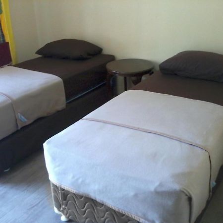 Hotel Cemerlang Distrikt Baturaden Zimmer foto